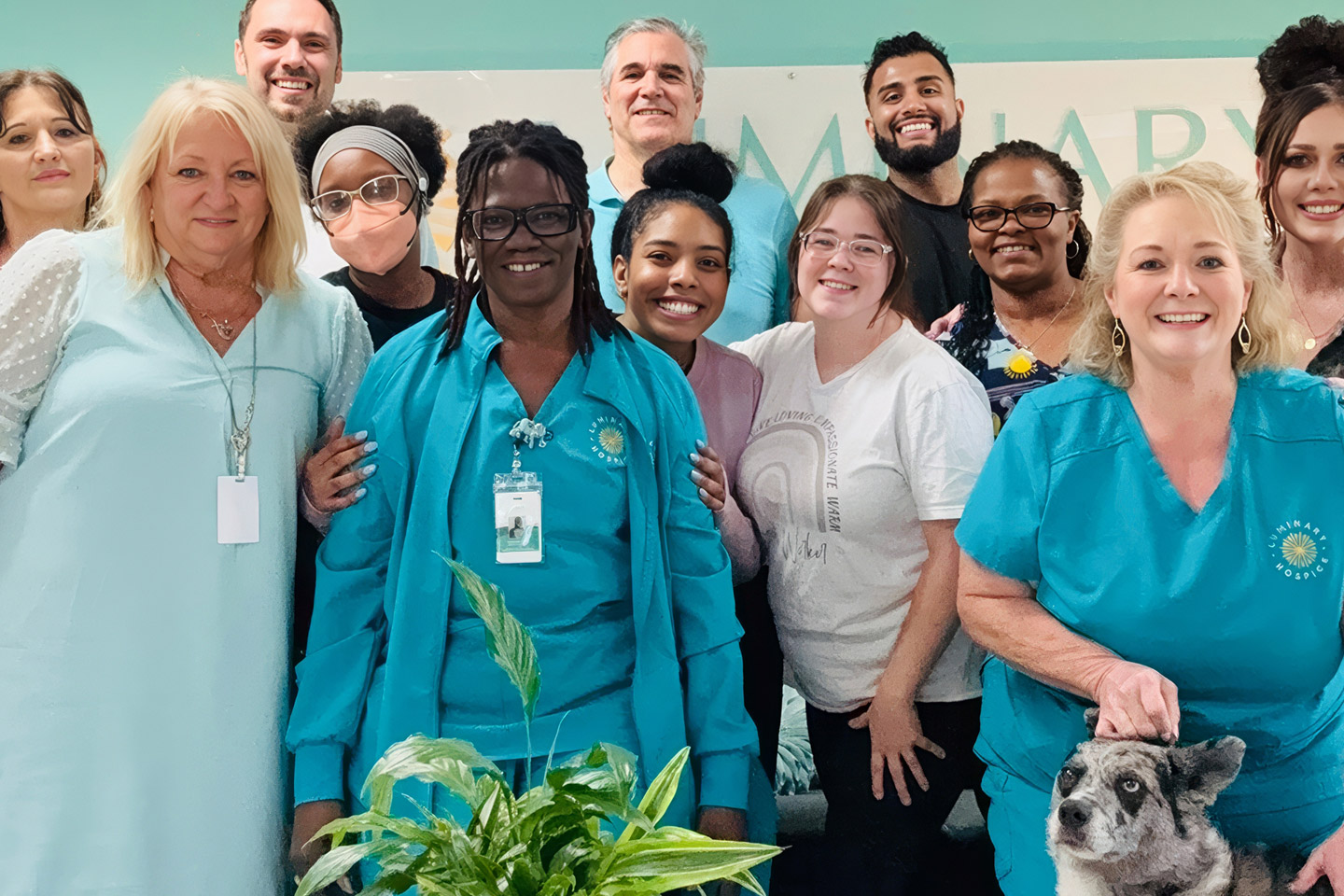 Diverse Luminary Hospice care team smiling together, representing a supportive community dedicated to compassionate, patient-centered care