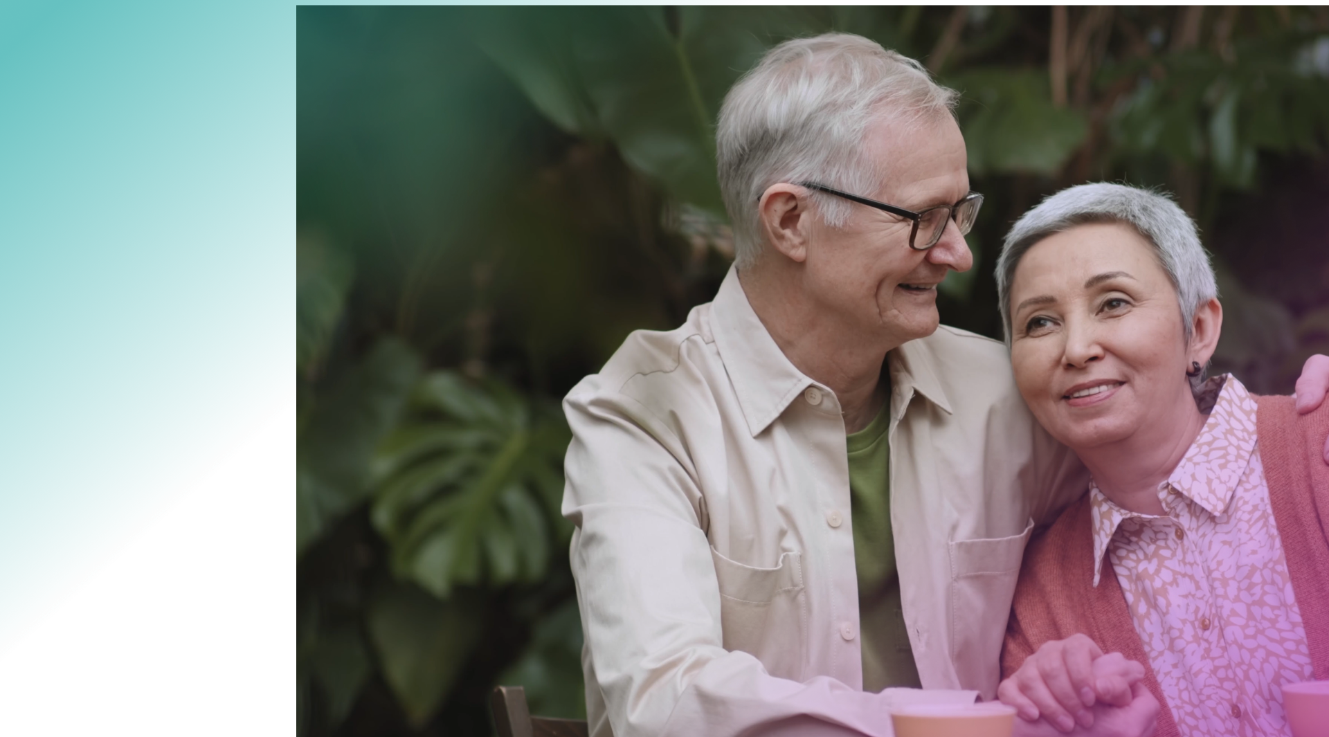 Older couple sitting together and smiling